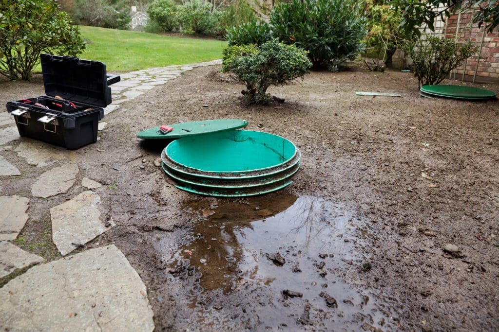 Excess pooling around a septic tank cover indicates there is a septic emergency.