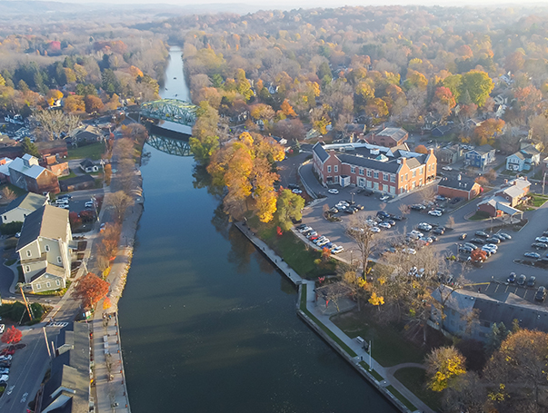 Riverside Pittsford town the oldest village in New York along Erie Canal in Monroe County with historic Schoen Place and colorful fall foliage