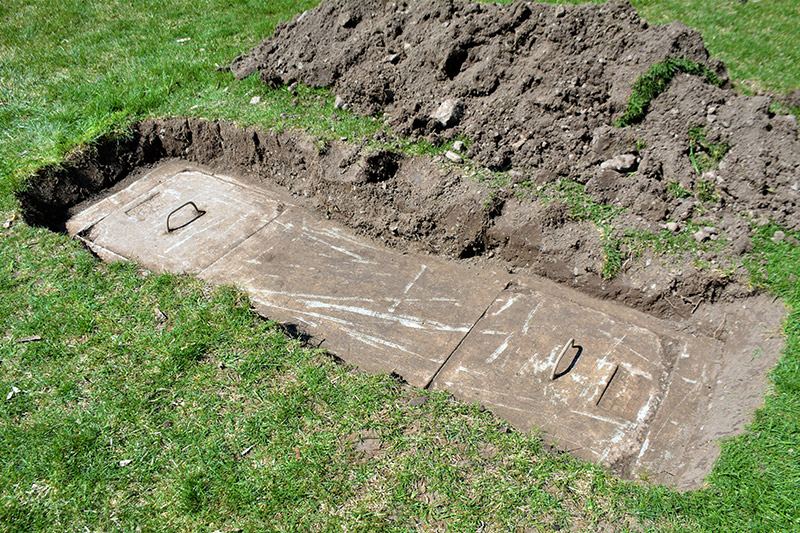 A septic tank underground